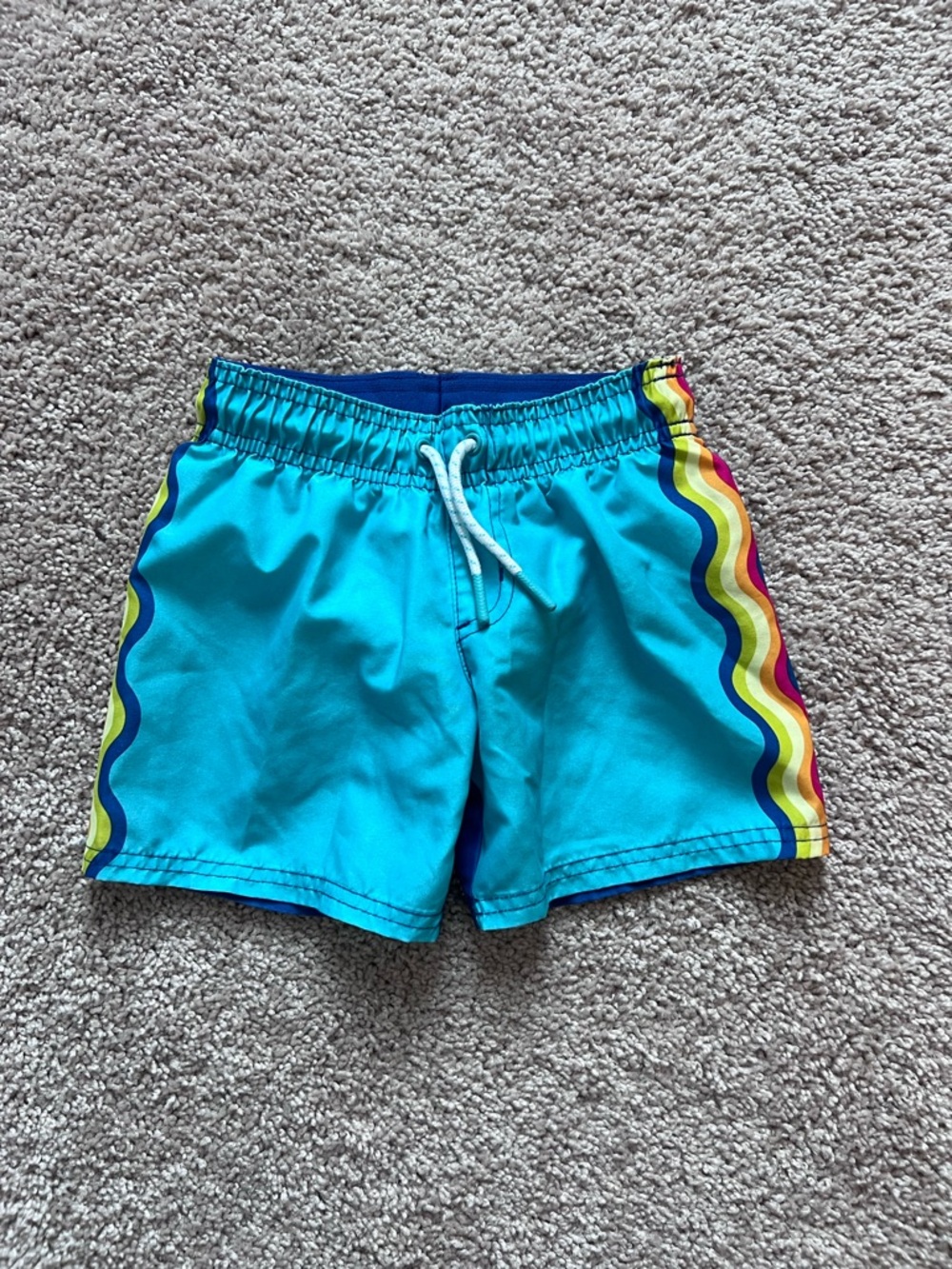 Kids Turquoise Swim Shorts with Rainbow Side Stripes 4T